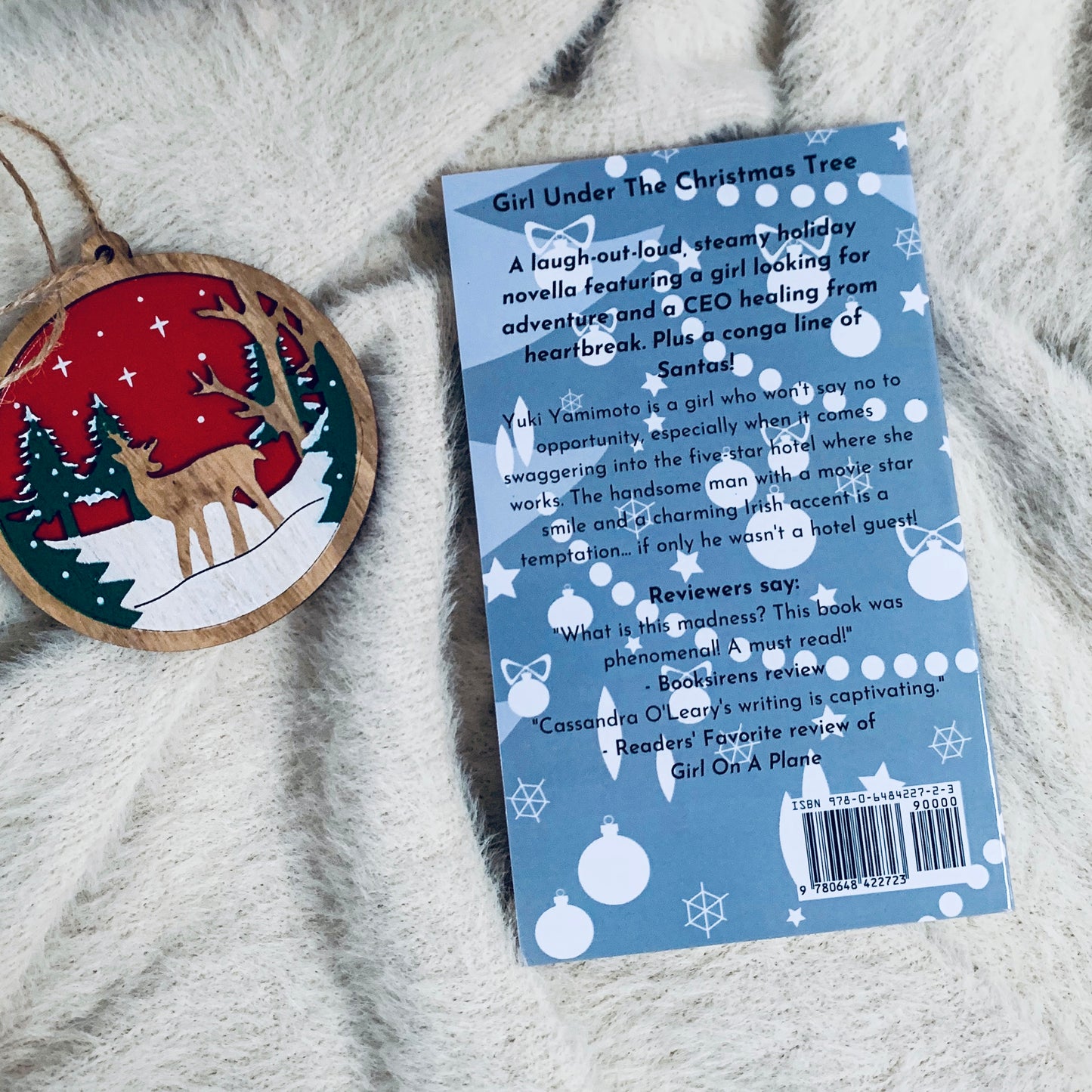 Girl Under the Christmas Tree by Cassandra O’Leary