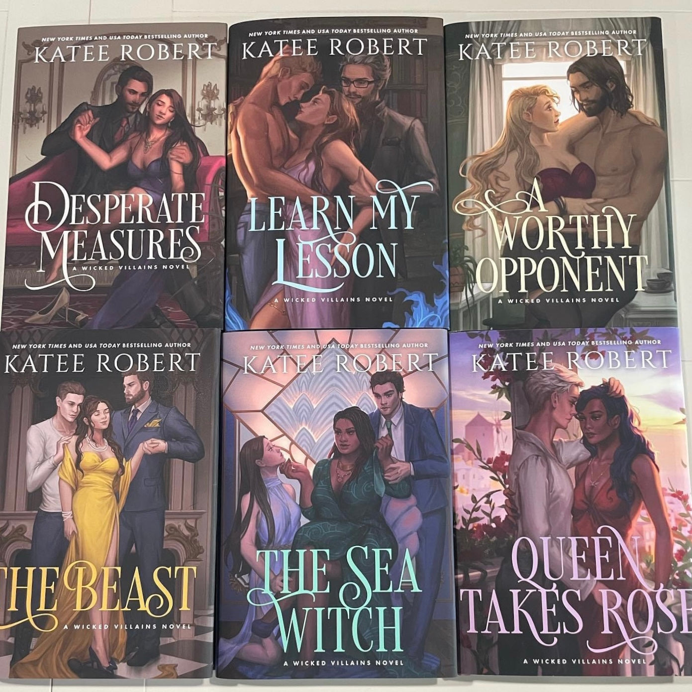 Wicked Villains hardcovers by Katee Robert